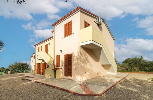 Masainas Apartment | Holiday Apartment "Is Lais 1" with Sea View, Shared Garden & Wi-Fi