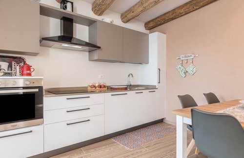 Levico Terme Apartment | Holiday Apartment 'L'Antica Corte Apt Mara' with Mountain View & Wi-Fi