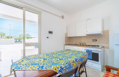 Granelli Apartment | Holiday Apartment "La Nassa" with Sea View, Private Terrace & Shared Garden