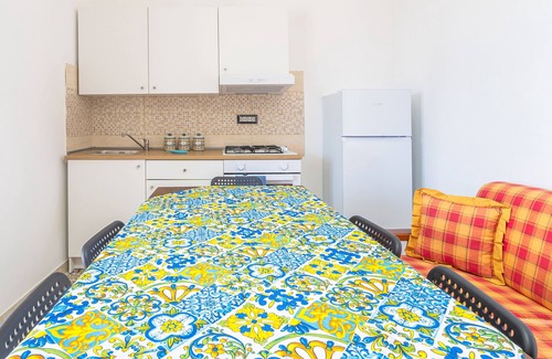 Granelli Apartment | Holiday Apartment "La Nassa" with Sea View, Private Terrace & Shared Garden