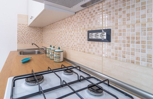 Granelli Apartment | Holiday Apartment "La Nassa" with Sea View, Private Terrace & Shared Garden