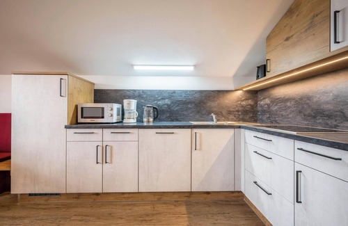 Maranza Apartment | Holiday Apartment "Residence Condor Schlern" with Mountain View, Sauna & Garden