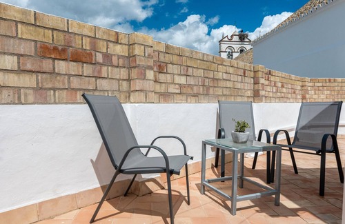 Marchena House | Holiday Home 'Santa Clara Home' with Private Terrace, Wi-Fi and Air Conditioning