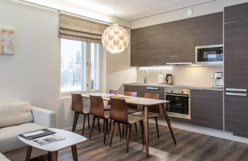 Tahkovuori House | Holiday Home Tahko spa red - vuori apartment by Interhome