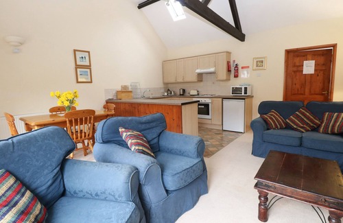 Wood Norton Cottage | HOLLY BERRY, family friendly, with a garden in Wood Norton