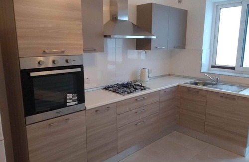 Marsaxlokk Apartment | Home a few meters from promenade, restaurants, beach, bus stop & parking.