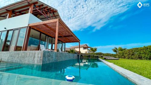 Ica Villa | HOP BALI exclusiva laguna y playa en Chincha