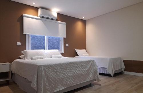 Carniel House | Hospedagem Jardins de Gramado