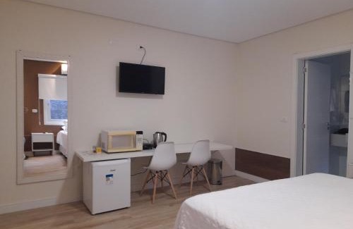 Carniel House | Hospedagem Jardins de Gramado