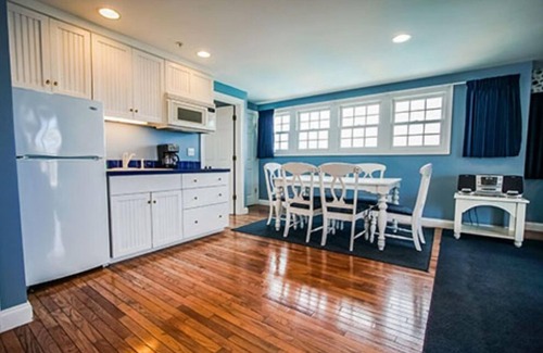 Falmouth Condo | Hot tub on your deck and beach across the street.Relax