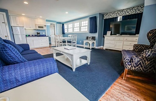 Falmouth Condo | Hot tub on your deck and beach across the street.Relax
