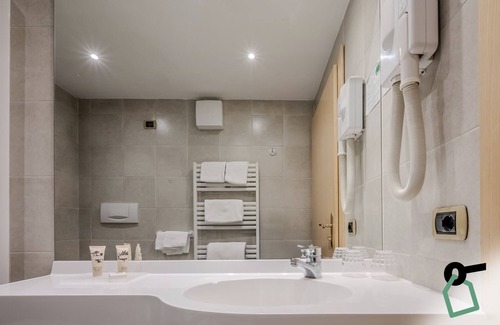 Campitello di Fassa Hotel | HOTIDAY Room Collection - Campitello