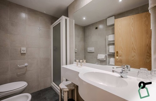 Campitello di Fassa Hotel | HOTIDAY Room Collection - Campitello