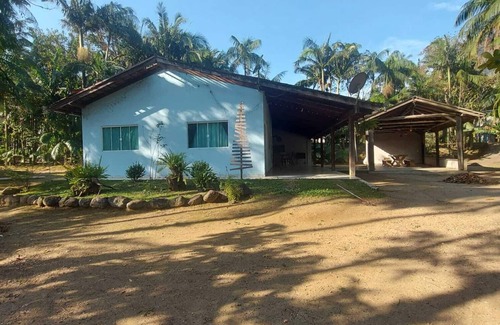 Guaratuba House | House facing the beautiful São João river, surrounded by nature.