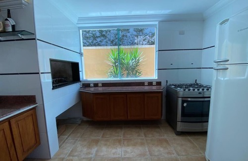 Vista Linda House | HOUSE "5" Stars; TOP! in the Condominium HANGA ROA - BERTIOGA - with 4 employees.