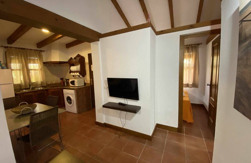 El Palmar House | House/bungalow in tourist complex with private garden and shared pool