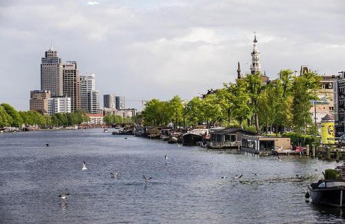 De Pijp Bed & Breakfast | Houseboat Amsterdam - Room with a view