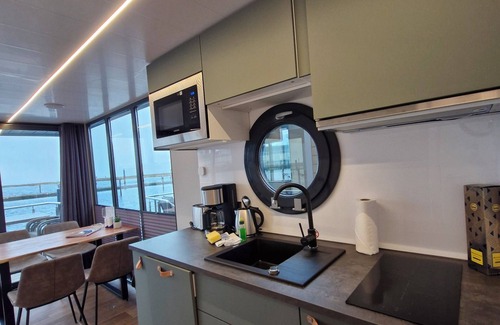Wendtorf Boat Rental | Houseboat Fjord Cirrus with bio sauna and roof terrace in Wendtorf