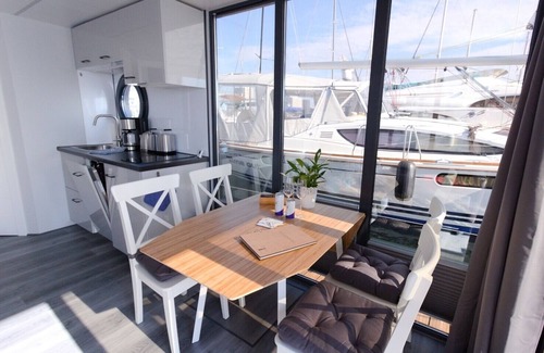 Wendtorf Boat Rental | Houseboat Fjord Lacerta with roof terrace in Wendtorf