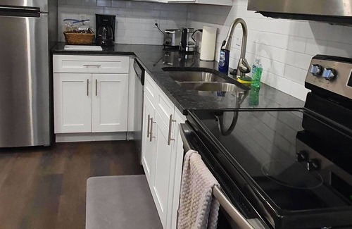 Olde Towne East Apartment | Housepitality - The Red Brick Inn - Luxury