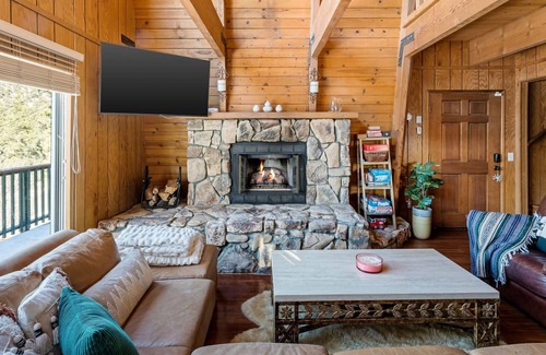 Whispering Forest Cabin | HUGE 3-story modified A-frame w/deck, forest views, hot tub, 10 mins from slopes