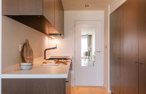 Oostduinkerke-Bad Apartment | Huswell - Modern studio with magnificent seaview