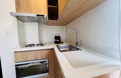 Zona Rosa Apartment | ICON 77 Apartasuites