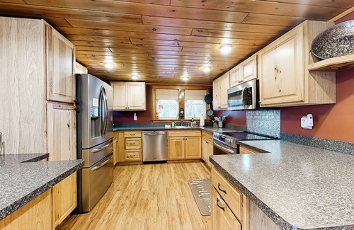 Laconia House | Idyllic lake retreat with pool, patio, & game room - near beach, skiing, & golf
