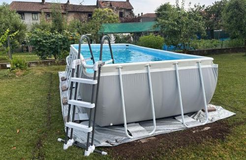 Agrate Apartment | Il terrazzo sul giardino