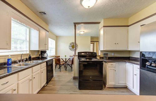 Beaumont Apartment | Indoor fireplace with patio and pool table