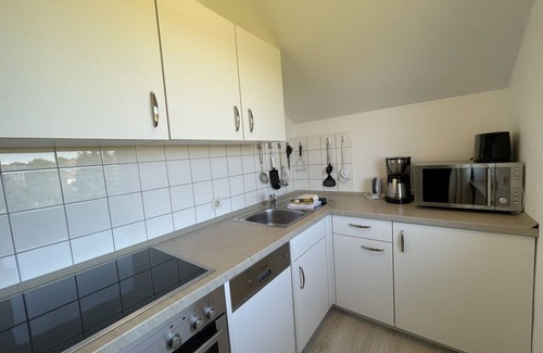 Borkum Apartment | Inselromantik zum Genießen: Ruhige Ferienwohnung an den Dünen