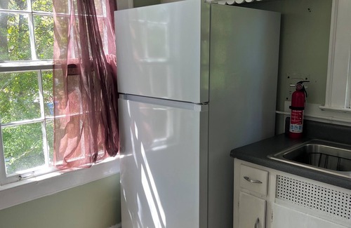 Edgewood Cottage | intown escape small cottage on half acre garden walk to edgewood shopping
