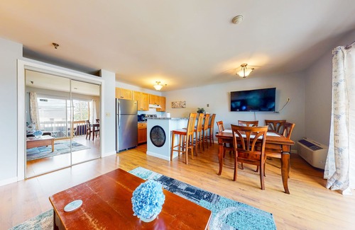 Gilford Condo | Inviting condo in quiet locale with partial lake views, balcony & grilling area