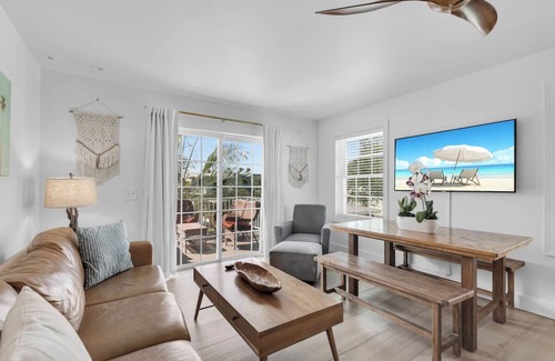 Long Key Hotel | Island Retreat 3BR: Canal Views, Full Kitchen, Private Pool & Paddle Board Fun!