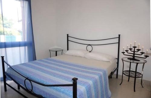 Porto Santa Margherita Apartment | Modern apartment with private garden