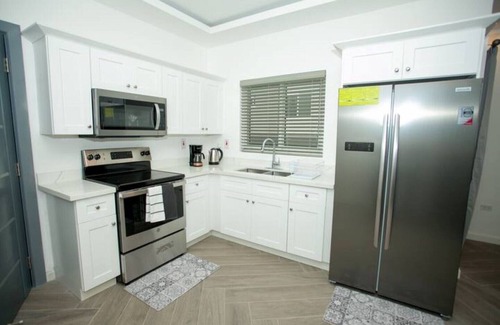 Jack's Hill Apartment | It's an Experience (IAE)Homes :Luxury Apt close to all the hot spots in Kingston