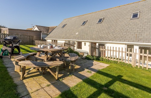 Polzeath House | Jalousie is located in a quiet cul de sac with wonderful sea views.