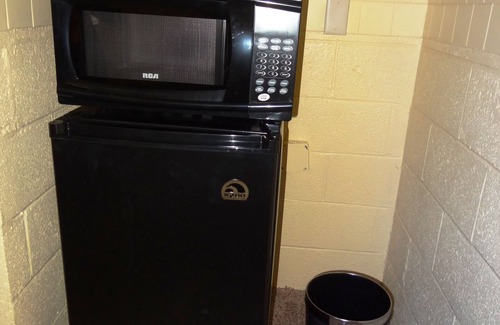 Mount Ida Apartment | JI8, Queen Guest Room at the Joplin Inn at entrance to the resort, , just 2 1/2 miles from Lake Ouachita. by RedAwning