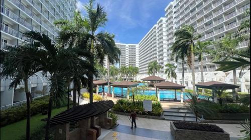Barangay 76 Apartment | Kathys Crib with balcony Pool view at Shell Residence