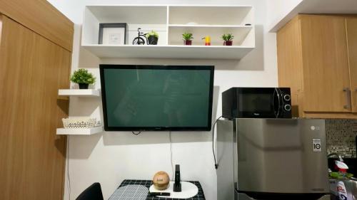 Barangay 76 Apartment | Kathys Crib with balcony Pool view at Shell Residence
