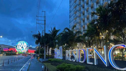 Barangay 76 Apartment | Kathys Crib with balcony Pool view at Shell Residence