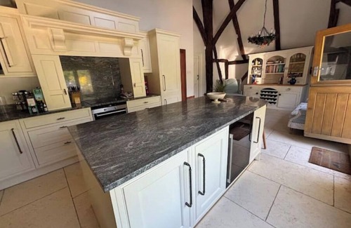 Sheldwich House | Kent barn private pool, hot tub & kids play area