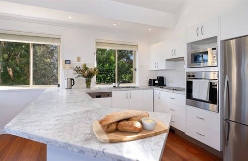 Kiama Villa | Kiama Haven - stunning views of Easts Beach, the ocean and the hills of the Kiama Coastal Walk.