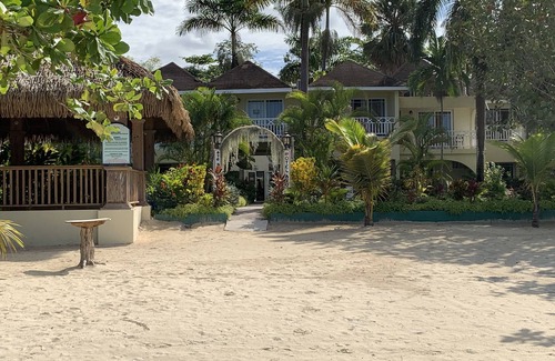 Negril Villa | King Suite at Oceanview Resort in Jamaica - Enjoy 7 Miles Of White Sand Beach! 1 Bedroom Villa by RedAwning