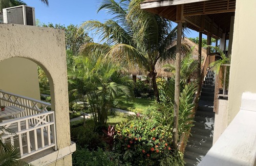 Negril Villa | King Suite at Oceanview Resort in Jamaica - Enjoy 7 Miles Of White Sand Beach! 1 Bedroom Villa by RedAwning