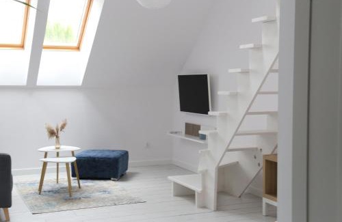 Barczewo Apartment | Komfortowe mieszkanie z antresolą i tarasem