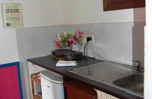 Loiri Porto San Paolo Apartment | L'AGLIENTU - BEGONIA ROOM