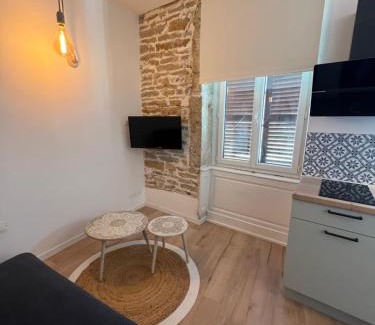 Centre-ville Apartment | L’appartement lumière