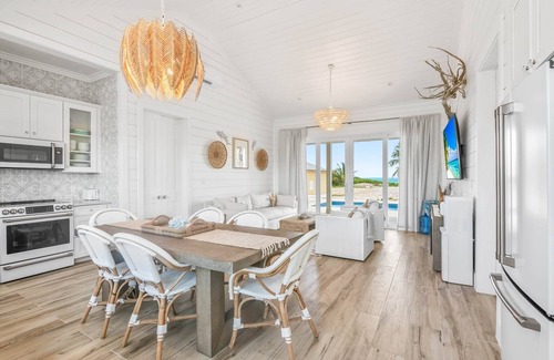 William's Town House | La Dolce Vita Cottage - Beachfront w/pool directly on Tropic of Cancer Beach!