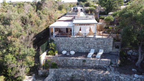 Patu House | La Torre di Merlino